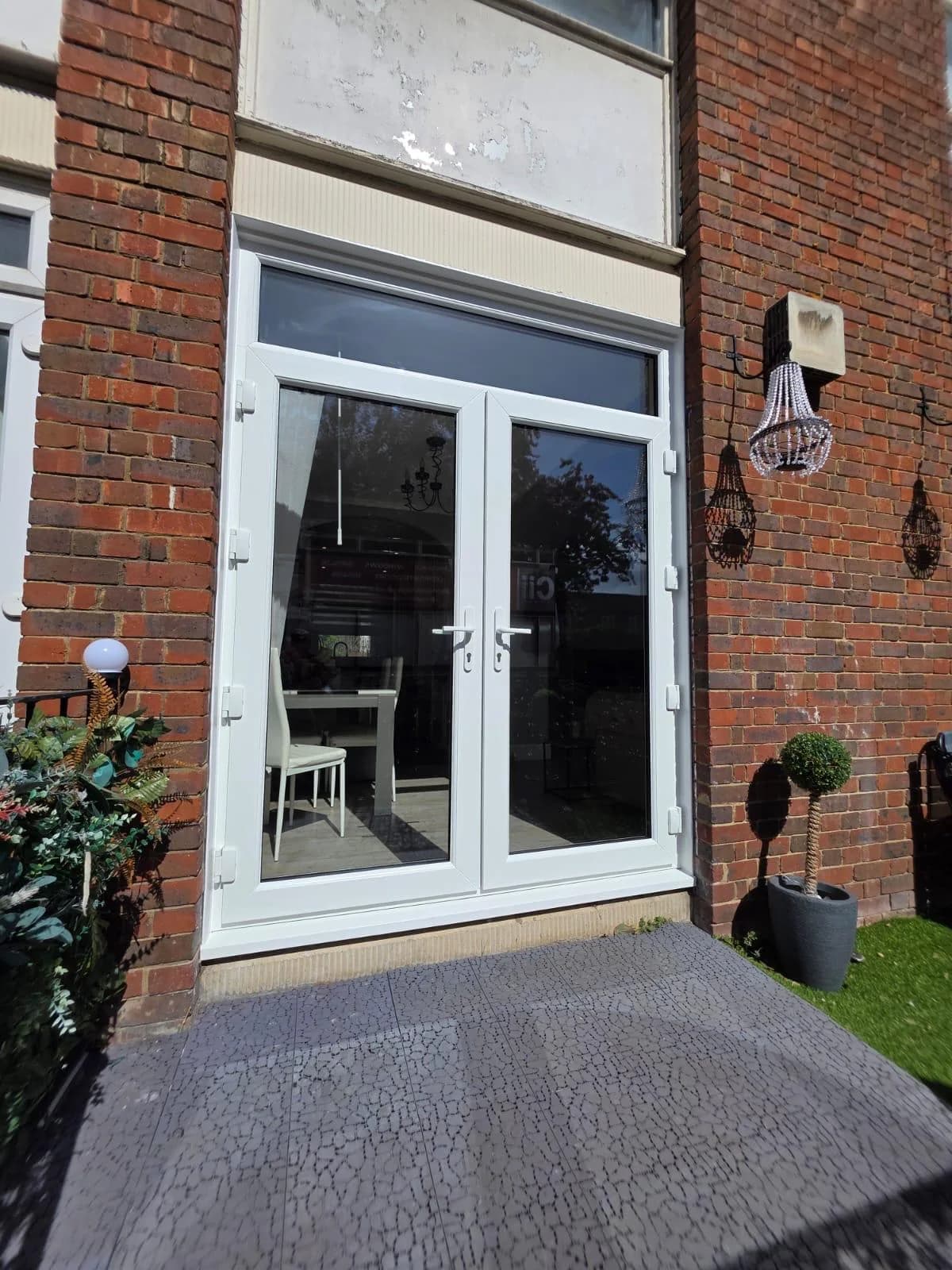 White uPVC French doors installed by Cii Double Glazing