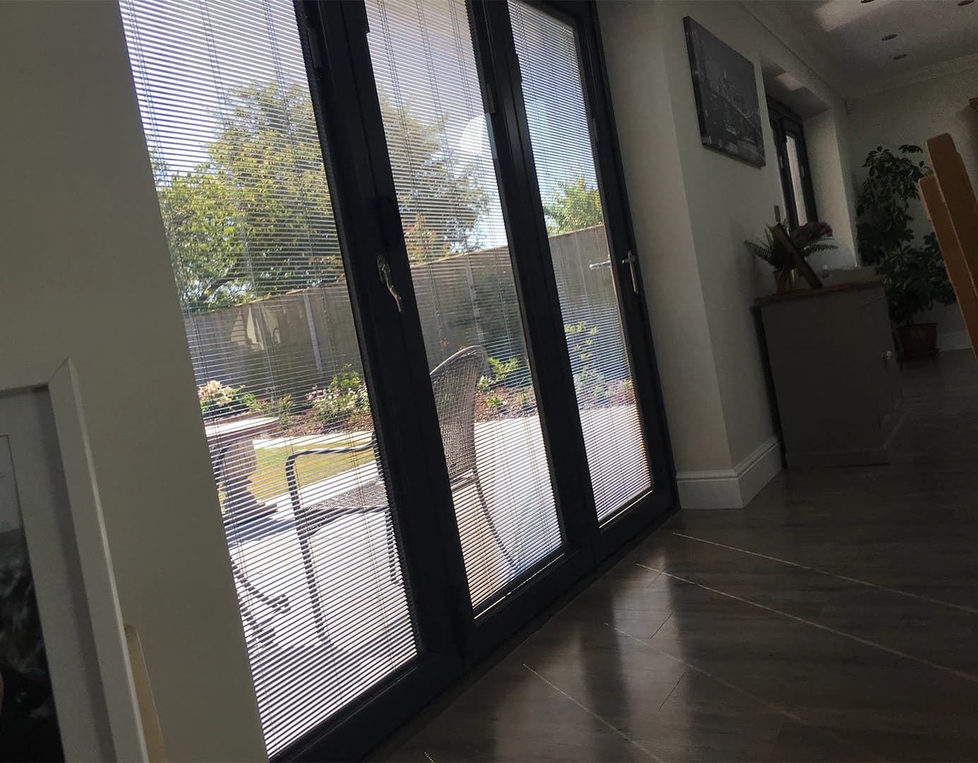 Glazed doors with integral blinds inside the glass for privacy and light control