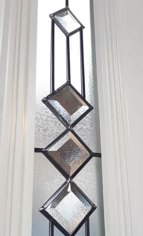 Diamond lead detail on a glazed composite door panel