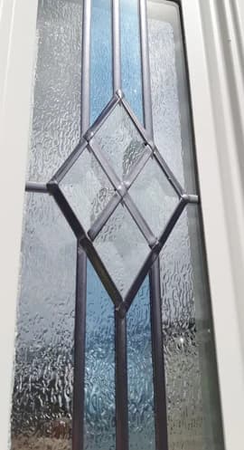 Bevelled diamond lead detail on obscure door glass