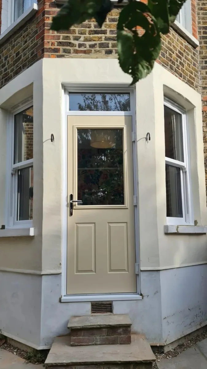 Cream composite door installed in Romford by Cii Double Glazing