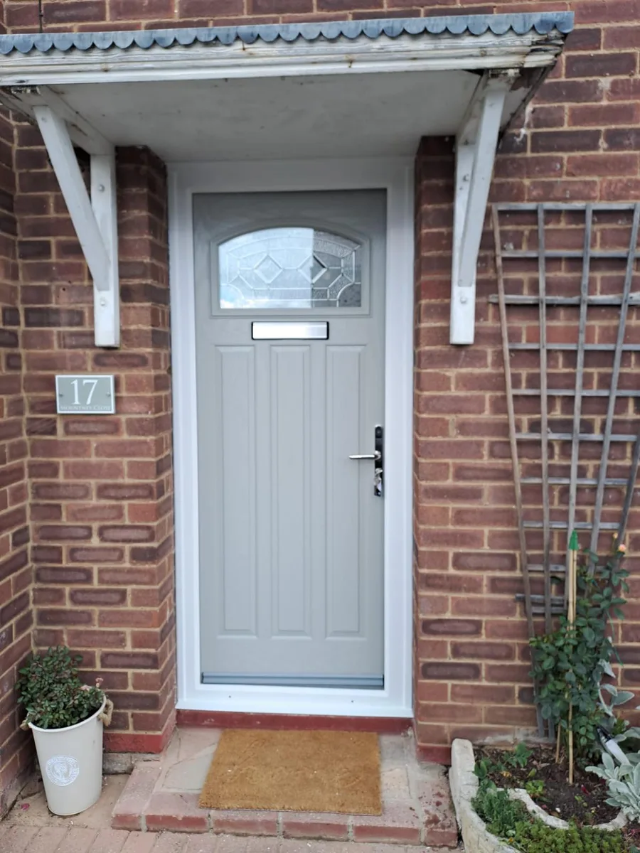 Slate grey composite front door with a leaded top light installed in Romford by Cii Double Glazing