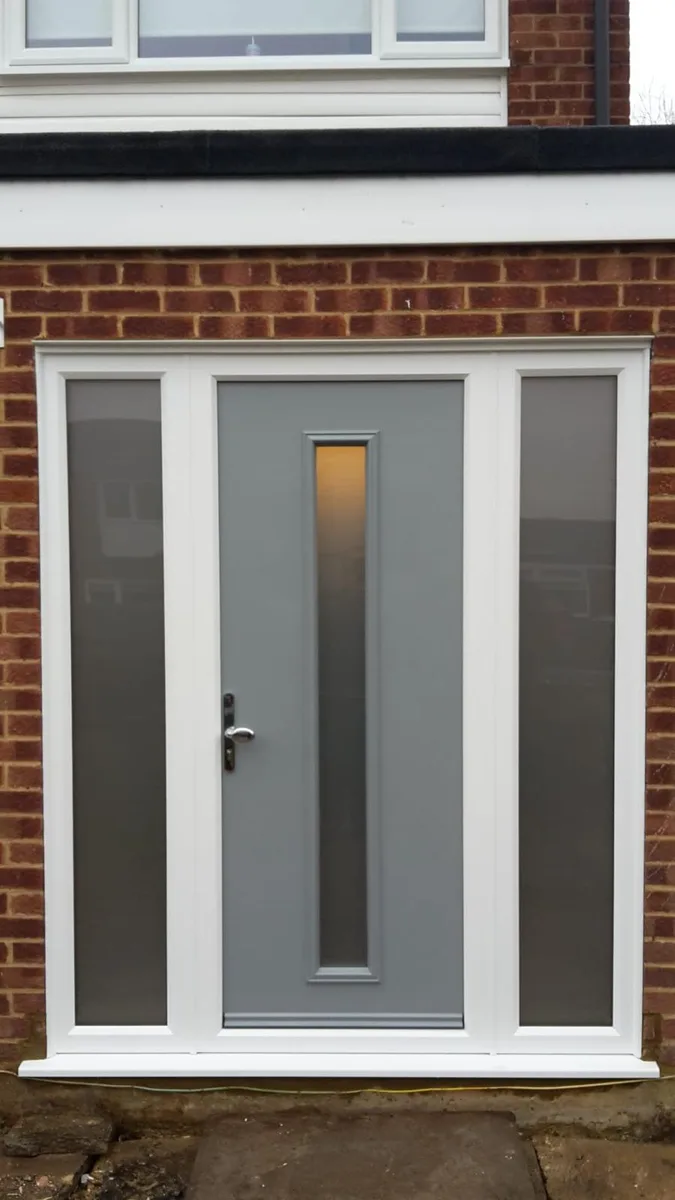 Slate grey composite front door with frosted side panels installed in Romford by Cii Double Glazing