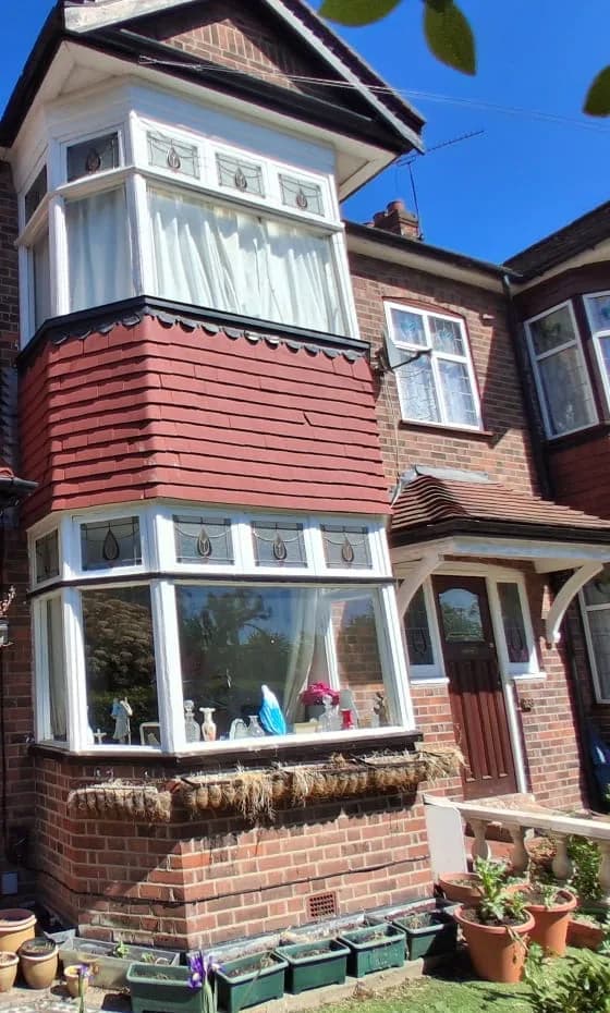 White uPVC bay windows with leaded top lights installed in Chelmsford by Cii Double Glazing
