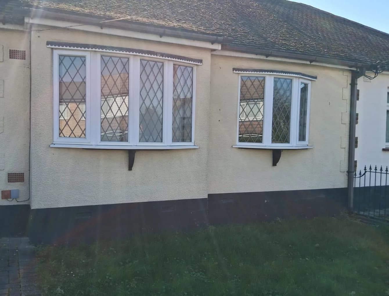 White uPVC bay windows with leaded glass installed in Chelmsford by Cii Double Glazing