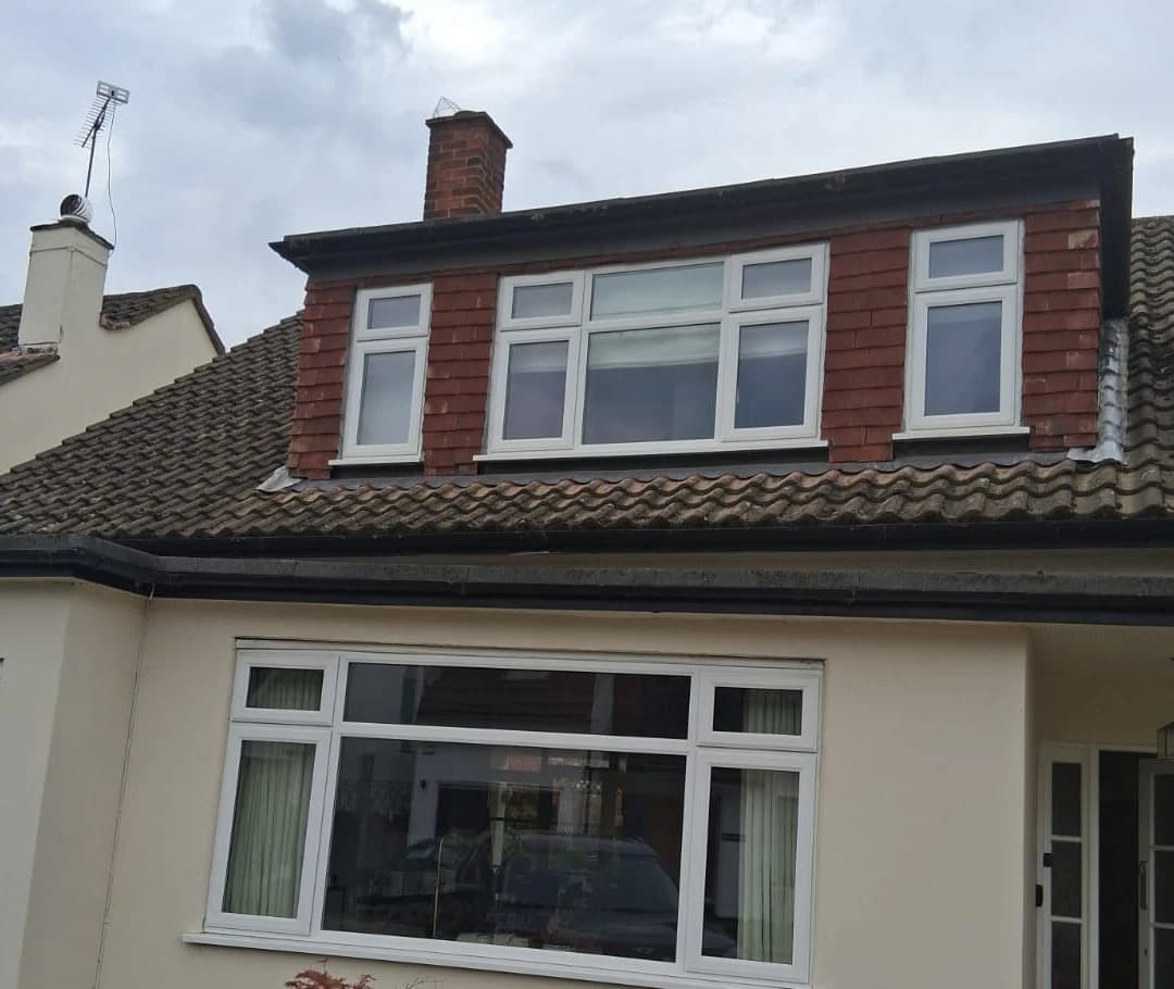 White uPVC casement windows on a house in Woodford Green before replacement by Cii Double Glazing
